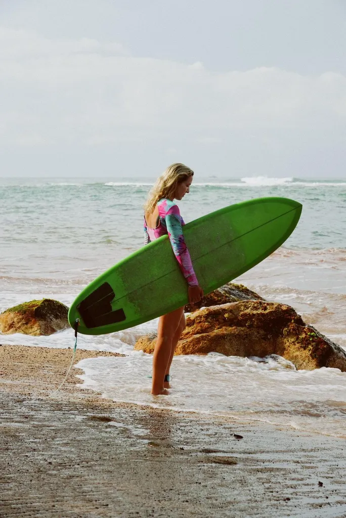 Woman meditating by the ocean